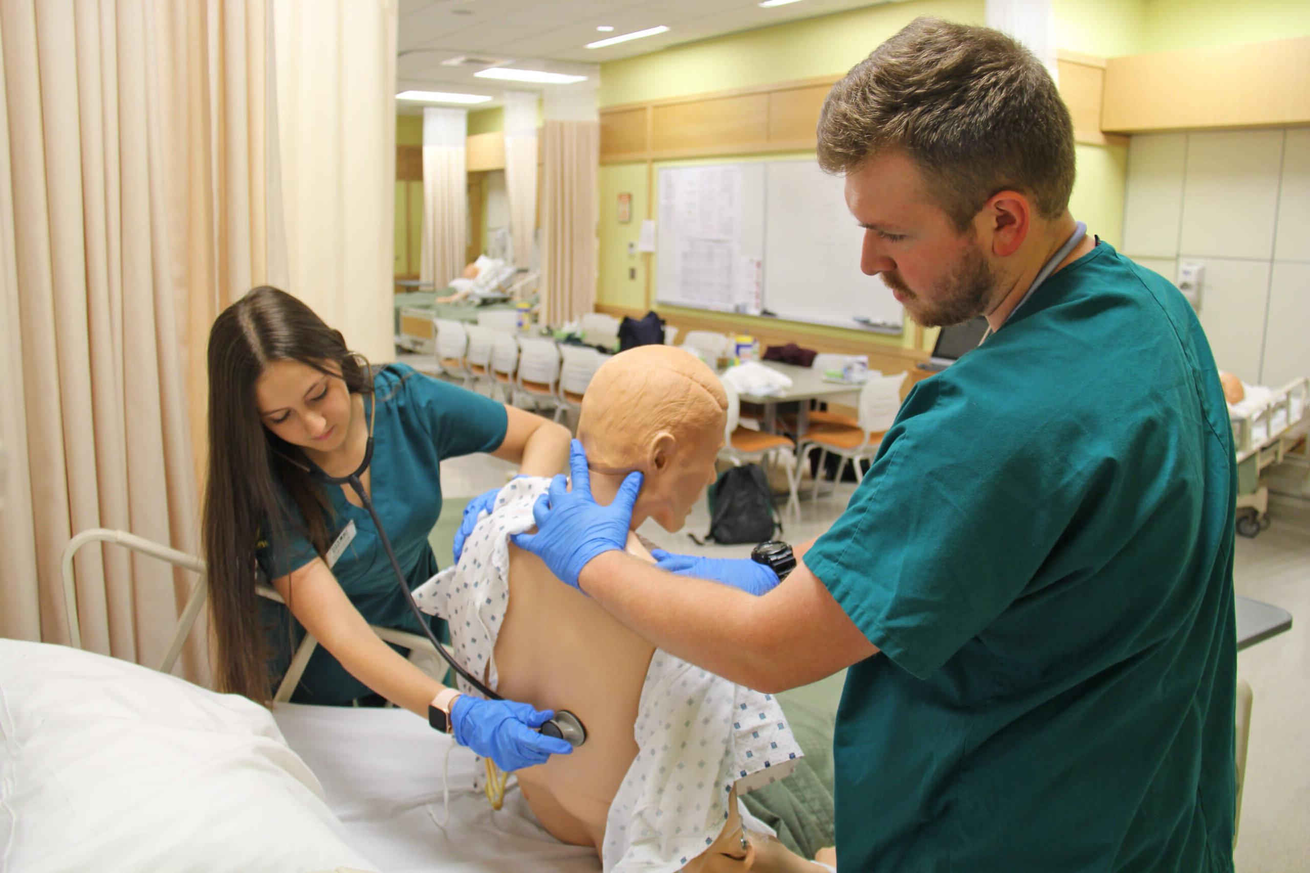 Photo of nursing students in the simulation lab